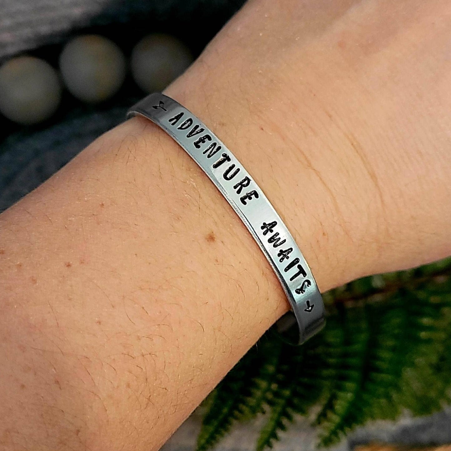 Hand stamped adventure awaits aluminum cuff